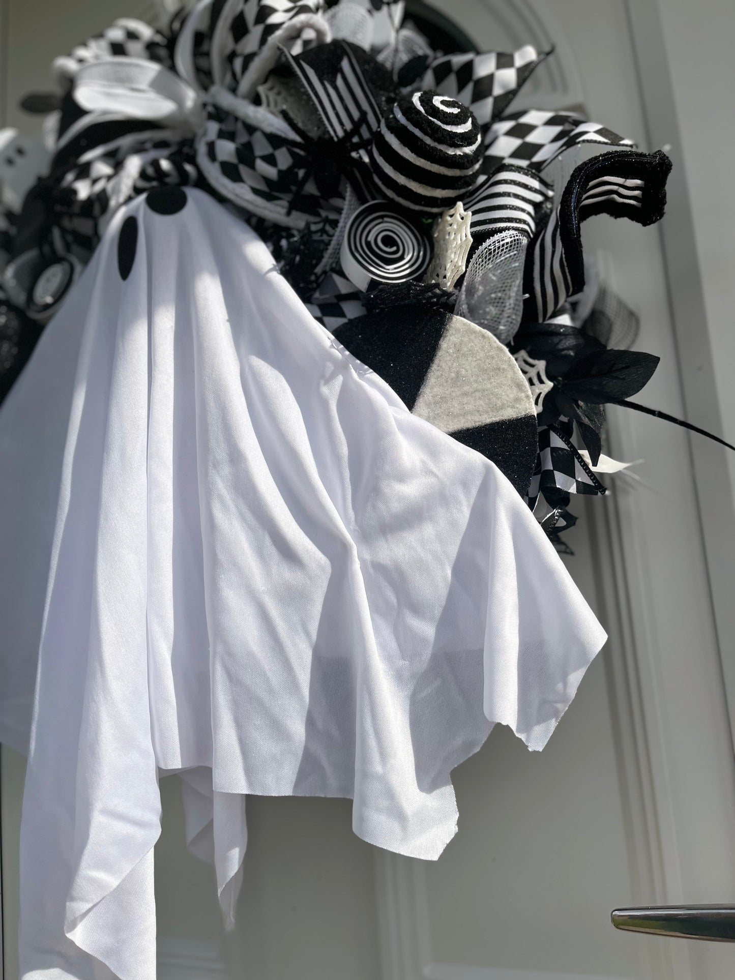 Light up black and white ghost wreath