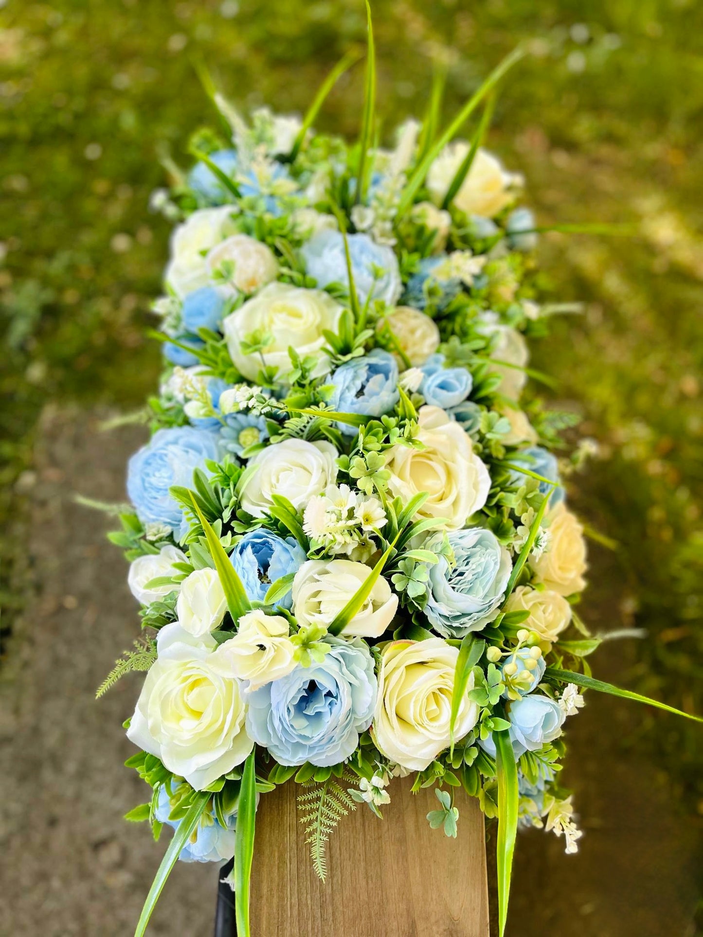 Extra large truck garden planter filled with artificial flowers