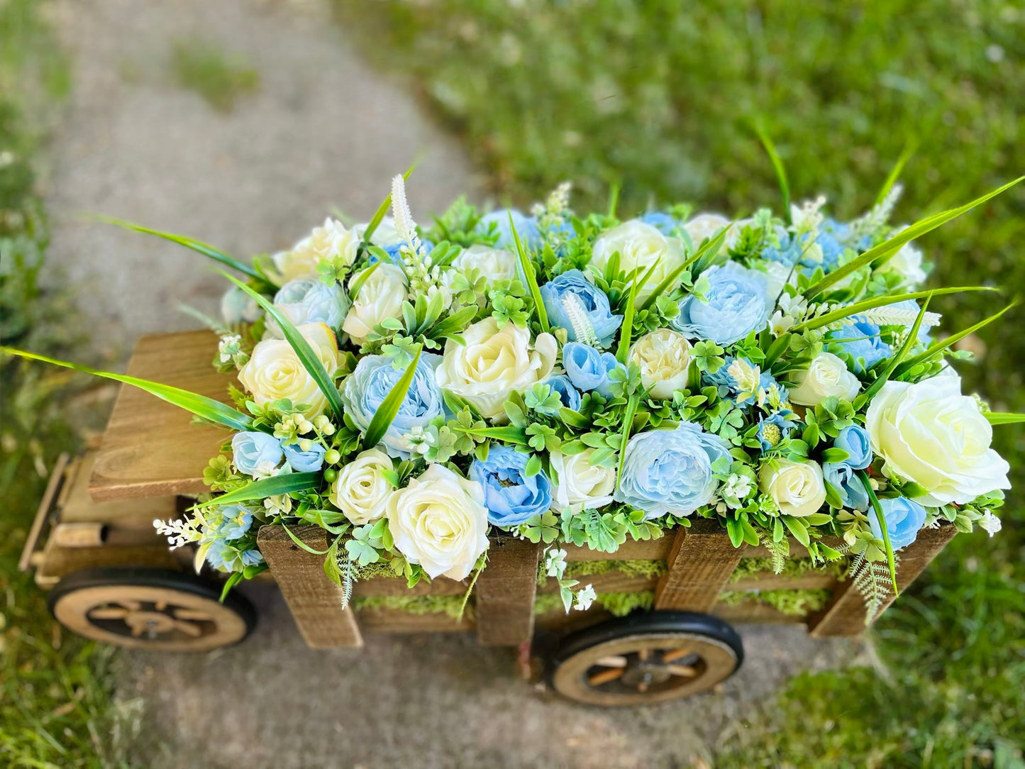 Extra large truck garden planter filled with artificial flowers