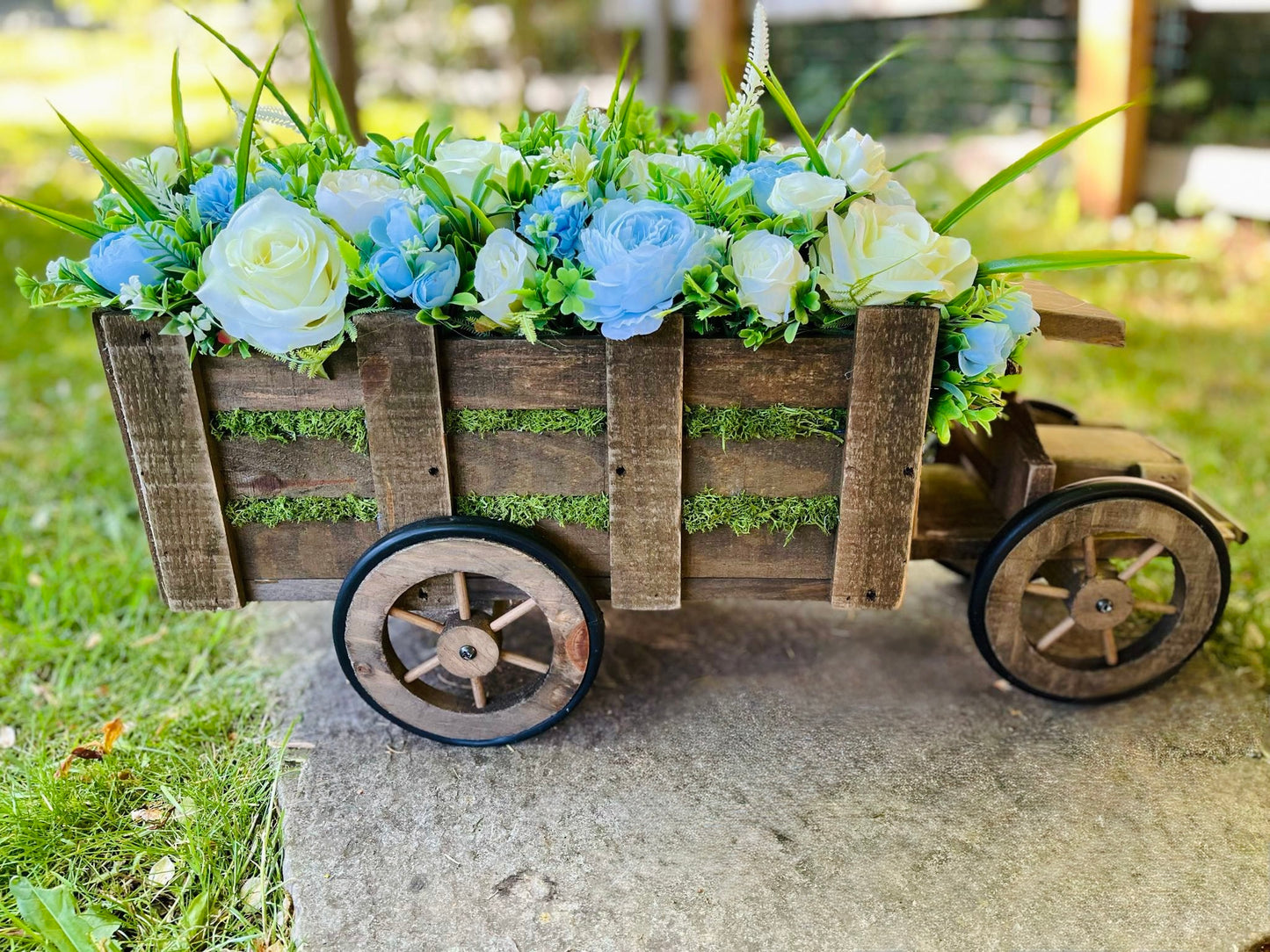 Extra large truck garden planter filled with artificial flowers