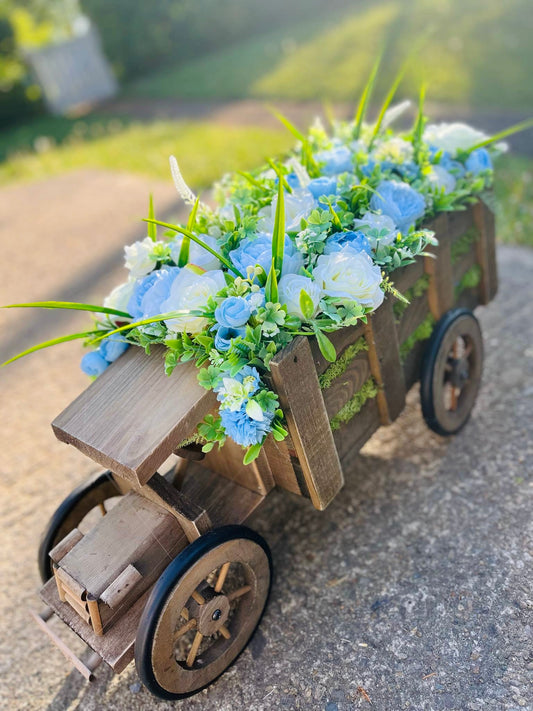 Extra large truck garden planter filled with artificial flowers